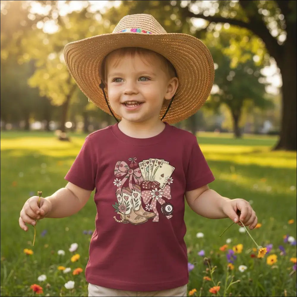 Maroon cotton Country Charm Kids T-Shirt with colorful cowboy boots, cards, and floral bows