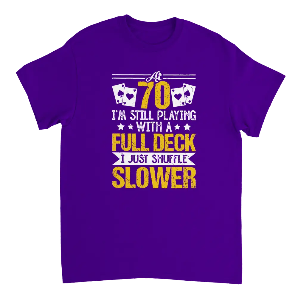 Purple short-sleeved t-shirt with Funny 70-Year-Old Playing with a Full Deck Shuffle Slower poker graphic in yellow and white text