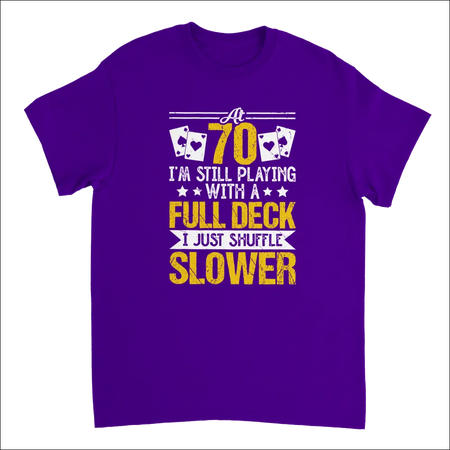 Purple short-sleeved t-shirt with Funny 70-Year-Old Playing with a Full Deck Shuffle Slower poker graphic in yellow and white text