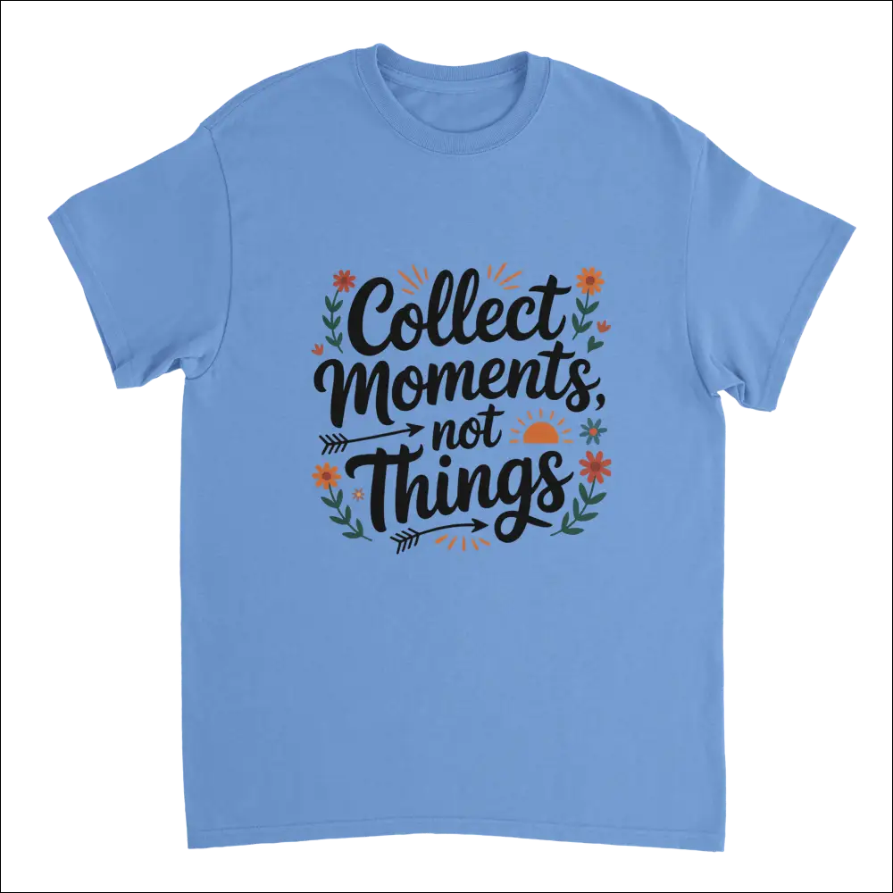 Light blue Moments Over Things T-shirt with cursive quote and floral design