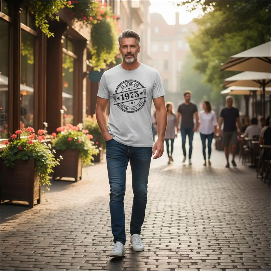 Man in light gray tee with Made in 1975 and Retro Not Old graphic