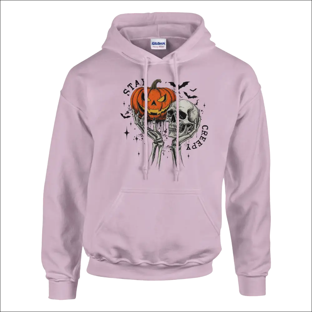 Light pink Stay Creepy unisex Gildan hoodie with Halloween pumpkin skull graphic