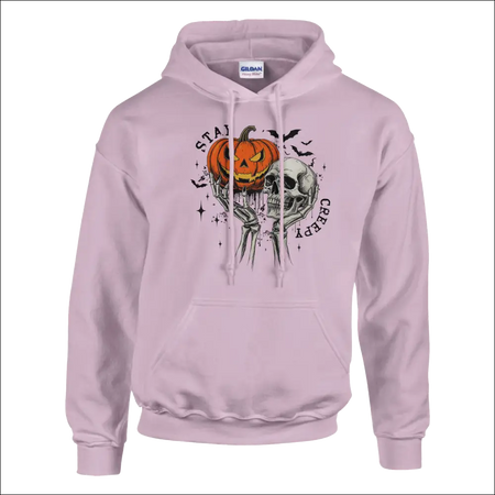 Light pink Stay Creepy unisex Gildan hoodie with Halloween pumpkin skull graphic