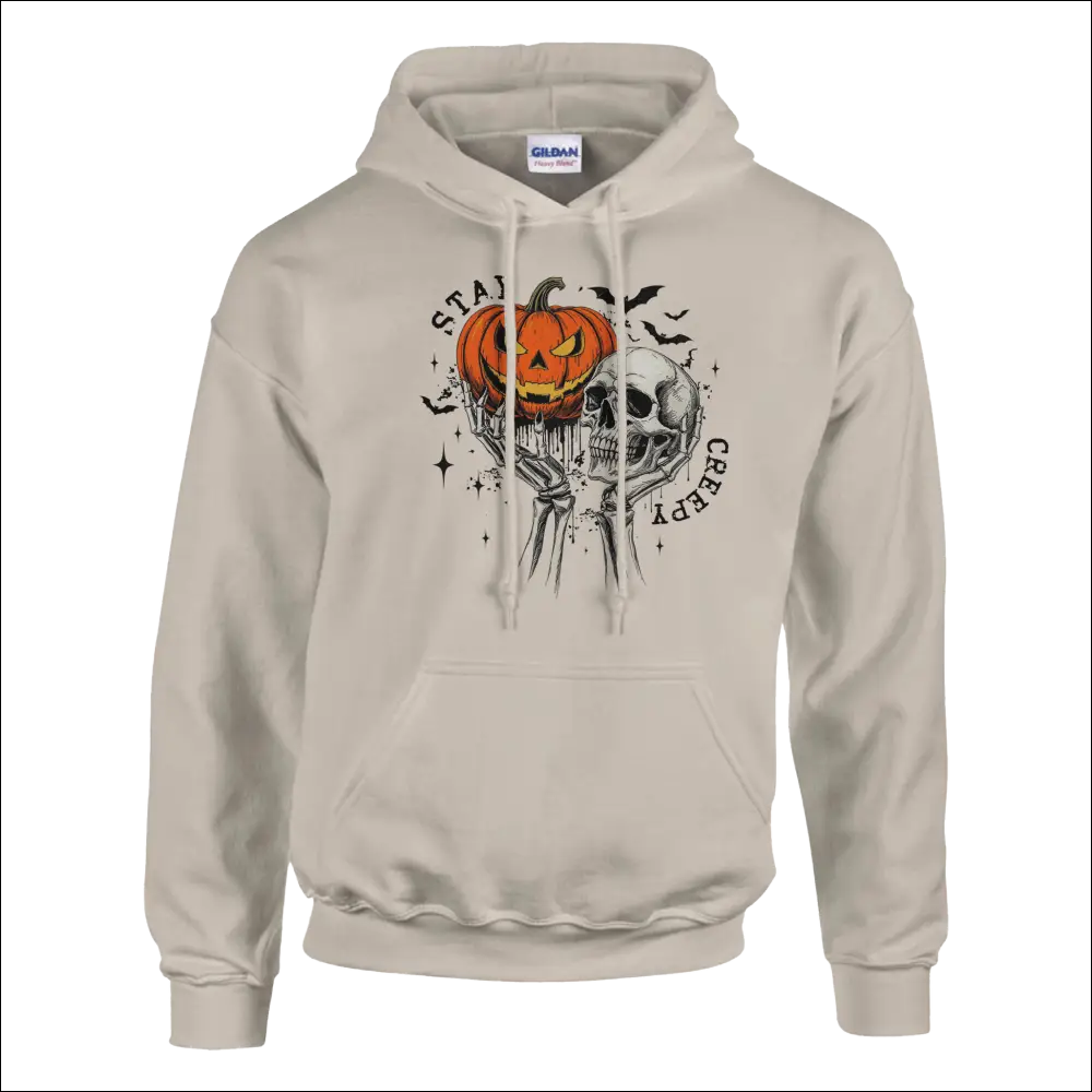 Beige Stay Creepy unisex Gildan hoodie with orange pumpkin skull Halloween graphic
