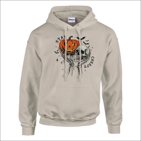 Beige Stay Creepy unisex Gildan hoodie with orange pumpkin skull Halloween graphic