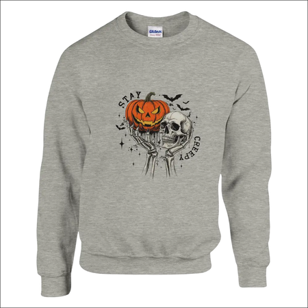 Stay Creepy gray Gildan unisex sweatshirt with Halloween jack-o-lantern and skull graphic