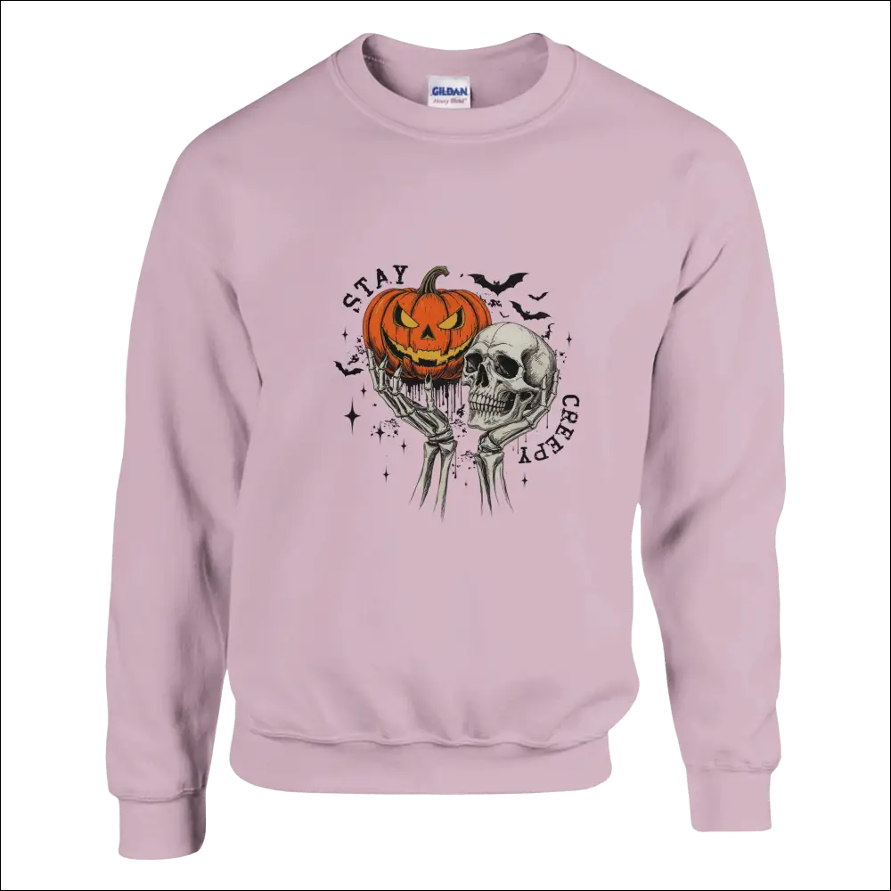 Stay Creepy unisex Gildan sweatshirt with glowing pumpkin skull graphic
