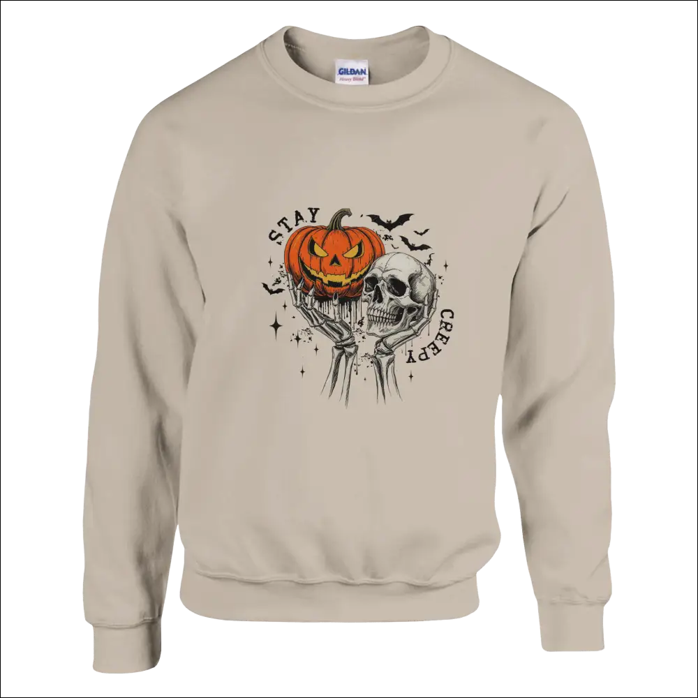 Beige Gildan Stay Creepy sweatshirt with jack-o-lantern skull graphic