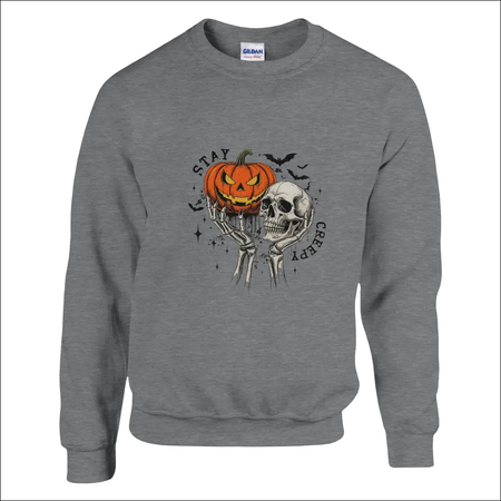 Gray Gildan Stay Creepy unisex sweatshirt with skeleton and pumpkin graphic