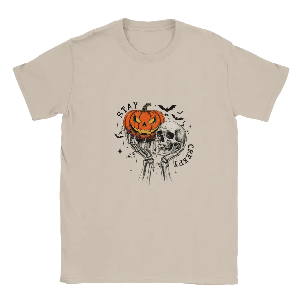 Stay Creepy unisex t-shirt with Halloween skeletal hands, pumpkin, and skull graphic