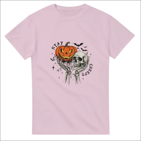 Stay Creepy unisex heavy cotton t-shirt with pink skeleton and pumpkin graphic