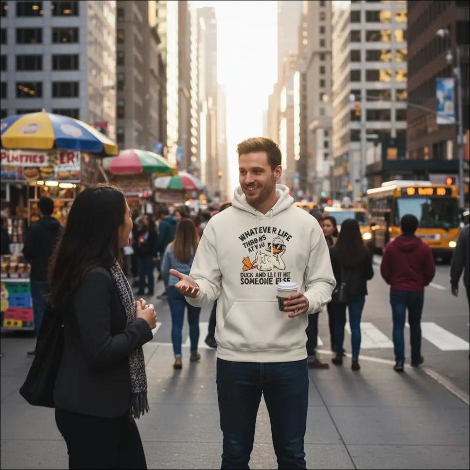 Cream-colored unisex hoodie with cartoon duck and humorous text