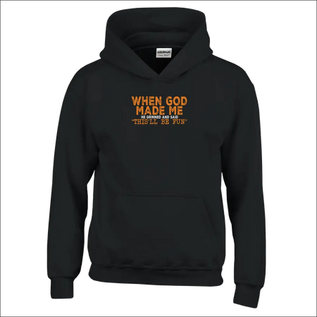 Black Gildan kids hoodie with orange text: When god made me he grinned and said this will be fun