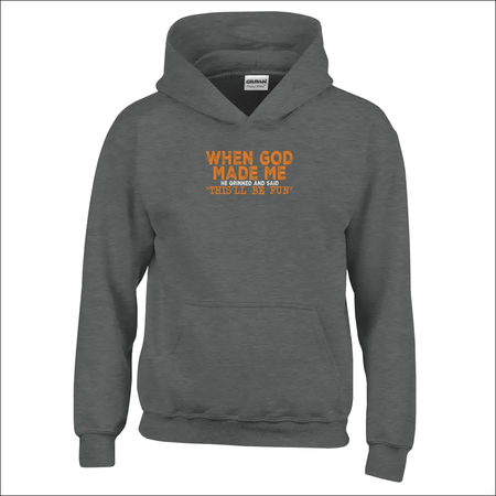 Dark gray Gildan kids hoodie with orange text: When god made me he grinned and said thisll be fun