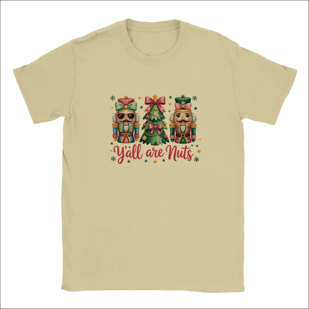 Beige short-sleeved unisex t-shirt with nutcrackers, Christmas tree, and Y’all Are Nuts graphic