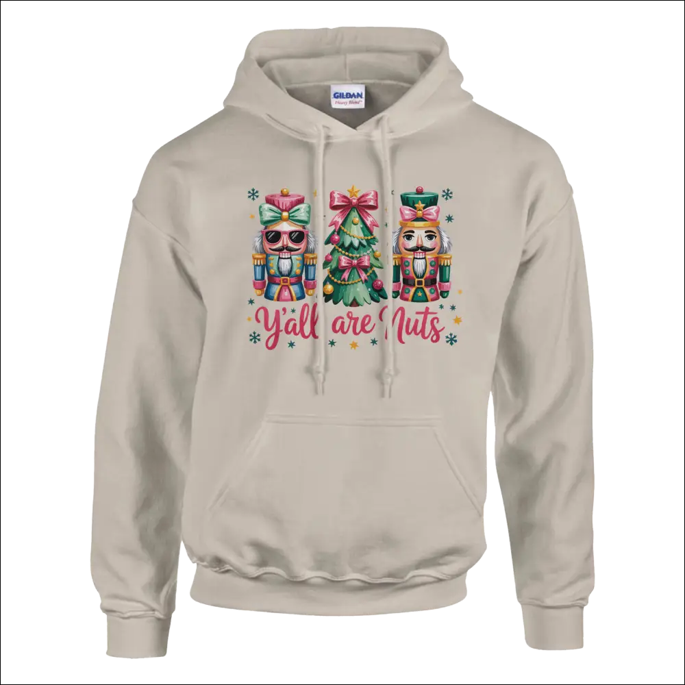 Beige Gildan Y’all Are Nuts Christmas hoodie with nutcrackers and tree graphic