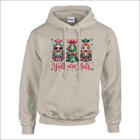 Beige Gildan Y’all Are Nuts Christmas hoodie with nutcrackers and tree graphic