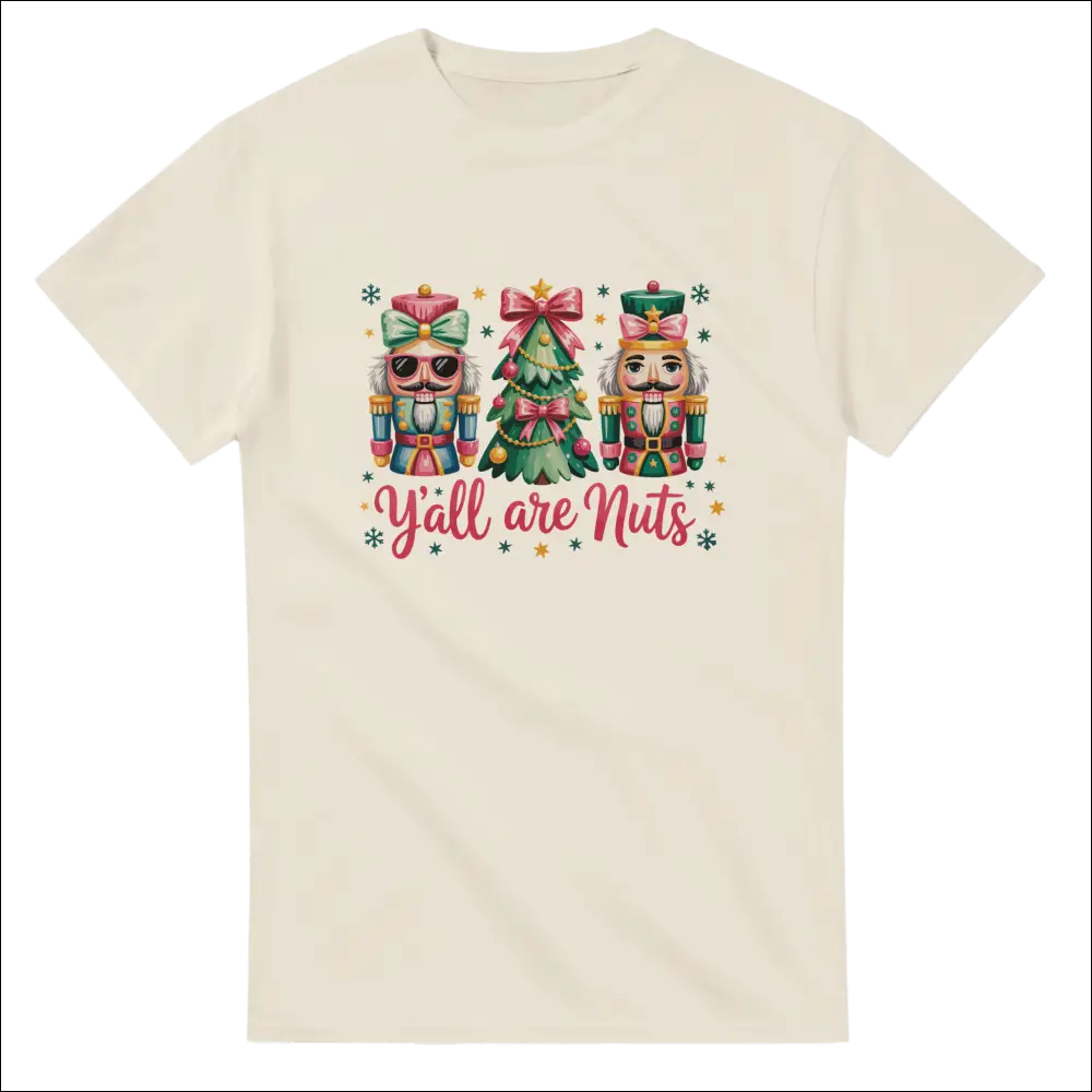 Cream-colored short-sleeved t-shirt with nutcrackers, Christmas tree, and yall are nuts text